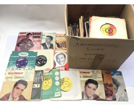 A box containing a collection of EPs, 7inch singles and LPs by various artists including Elvis Presley, The Beatles, The Roll