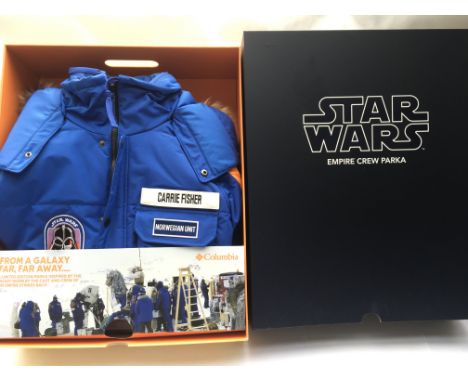 A boxed and as new Star Wars empire crew parka jacket. Size extra small with customised Carrie Fisher name patch.