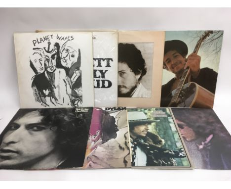 Fifteen Bob Dylan LPs including 'Nashville Skyline', 'Blood On The Tracks', 'Self Portrait' and others.