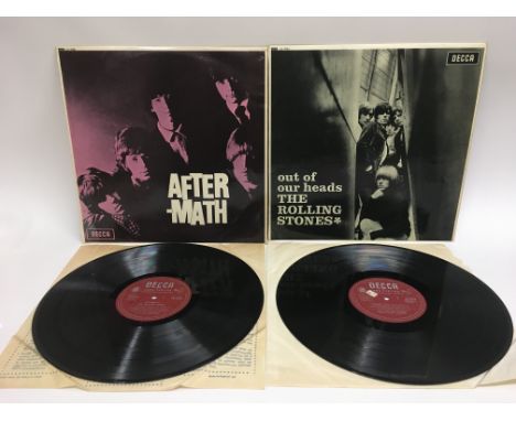 Two early UK pressings of Rolling Stones LPs comprising' Aftermath' and 'Out Of Our Heads'. Both have visible scratches, 'Aft