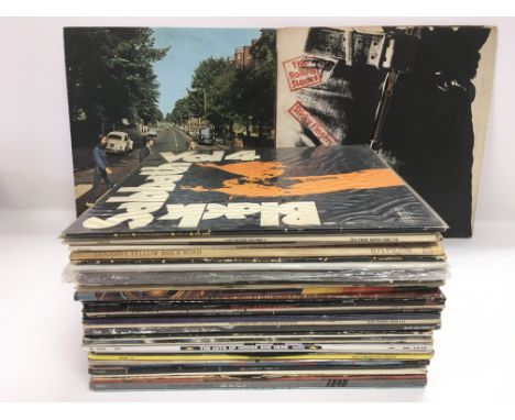 A collection of approx 40 plus LPs and 12inch singles by various artists including The Beatles, The Rolling Stones, Black Sab