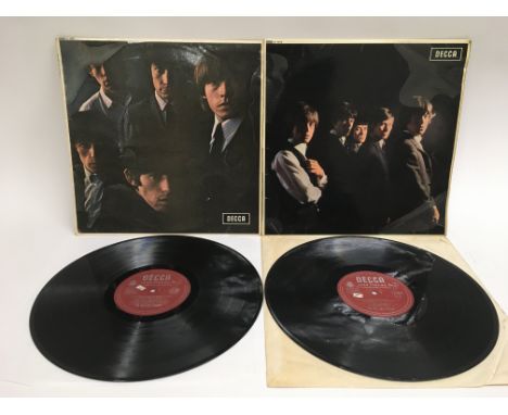 Two early UK pressings of the first two Rolling Stones LPs. Both record sleeves have been written on by the original owner an