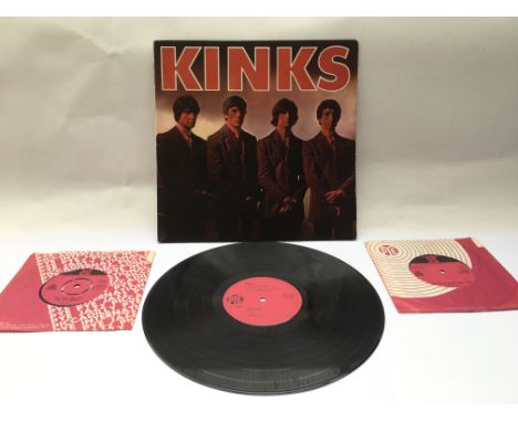A first UK pressing of the Kinks debut LP, NPL.18096. Condition of vinyl is excellent, sleeve VG+. Comes together with two 7i