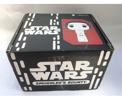 A collection of Carrie Fisher and Star Wars related items including a signed print, various publicity stills, audiobooks, a p