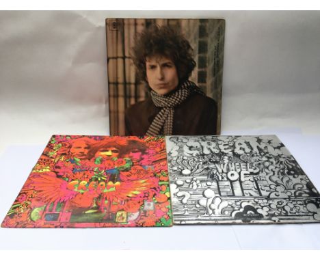 Two Cream LPs comprising 'Disraeli Gears' and 'Wheels Of Fire' together with 'Blonde On Blonde' by Bob Dylan (3).