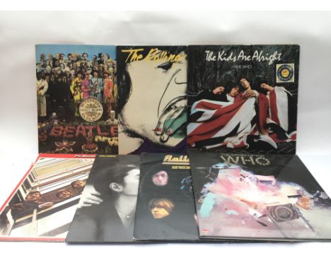 Seven LPs by various artists including The Beatles, The Rolling Stones and The Who.