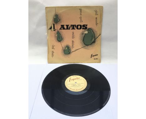 A first UK pressing of the Phil Woods Four Altos Group LP on the Esquire label 32-074. Condition of vinyl is VG+, sleeve has 