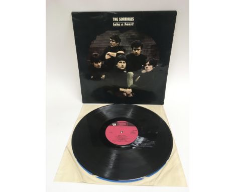 A first UK pressing of The Sorrows LP 'Take A Heart' NPL38023. Record sleeve has some creasing, nothing bad. Vinyl has light 