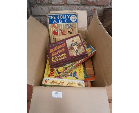 box of vintage jigsaws and games