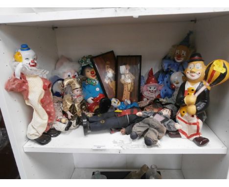 shelf of clown figurines