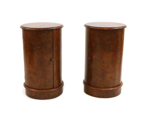 A pair of walnut pot cupboards, wih plain tops, each with a shaped shelf, 43cm diameter, 72cm high (2)