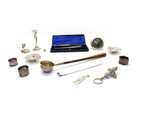 A collection of silver items, to include a cased set of three graduated patent sugar tongs, by The Vilcar Company, London 190