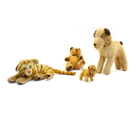 A Steiff Lion, in a standing pose, 13cm wide, a Steiff tiger, with green eyes, 40cm a Chad Valley teddy bear, 24cm high, and 