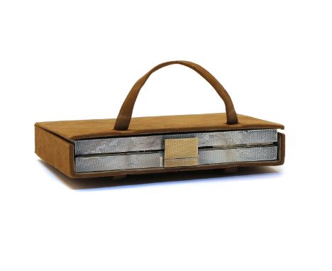 An Art Deco silver travelling vanity case, with engine turned decoration, cased and containing mirror, compact, comb and lips