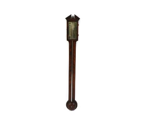 A late Georgian mahogany stick barometer, by J Gobbi &amp; Co, with a broken arch pediment above a silvered dial, an exposed 