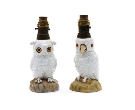 Two Edwardian owl oil lamps, both with glass eyes. Each approx 23cm highCondition report: One lamp with badly damaged and res