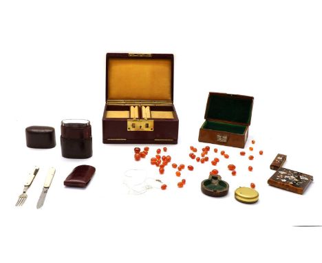 A collection of items, comprising a pocket barometer, an inlaid tortoiseshell card case, a leather jewellery casket and a 'Co