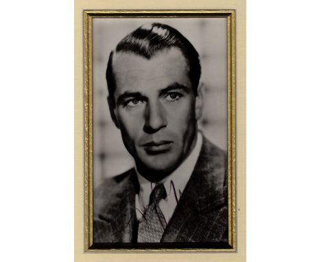 COOPER GARY: (1901-1961) American Actor, Academy Award winner. Vintage signed postcard photograph of Cooper in a head and sho