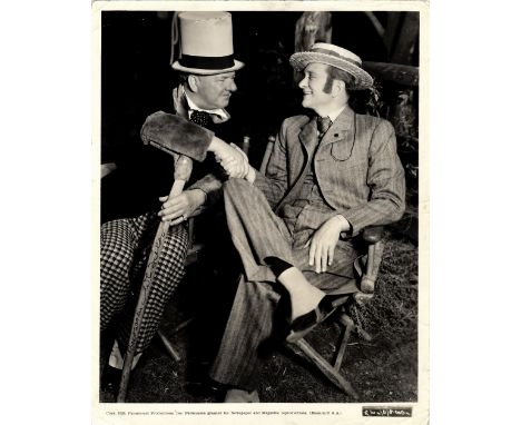 FIELDS W.C.: (1880-1946) American Film Comedian. Vintage signed 8 x 10 photograph of Fields seated in a full length pose in c