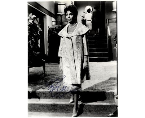 DANDRIDGE DOROTHY: (1922-1965) African-American Actress. Vintage signed and inscribed 8 x 10 photograph of Dandridge standing