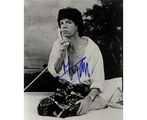 JAGGER MICK: (1943-     ) English Rock Musician, lead vocalist with The Rolling Stones. Signed 7.5 x 9.5 photograph of Jagger