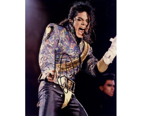 JACKSON MICHAEL: (1958-2009) American Pop Singer. Signed colour 8 x 10 photograph of Jackson performing in a three quarter le