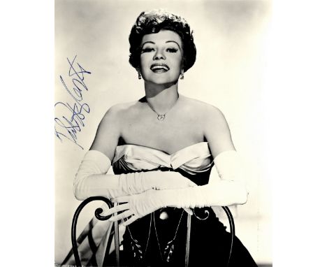 HAYWORTH RITA: (1918-1987) American Actress. Vintage signed 7.5 x 9 photograph of the glamorous actress in a three quarter le