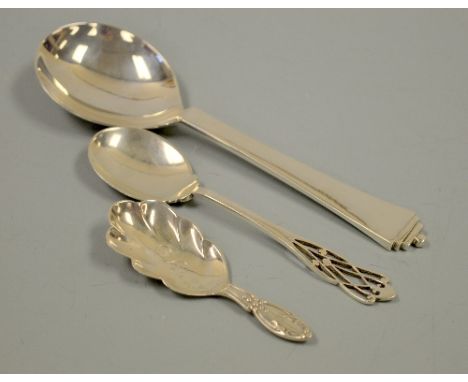A GEORG JENSEN PYRAMID PATTERN SILVER SPOON, approximately 18cm long, together with London 1925 pierced handle silver caddy s