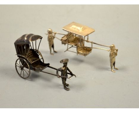 TWO CHINESE SILVER NOVELTY FIGURE GROUPS, rickshaw with canopy and operator, approximately 8cm x 5cm high, together with a se