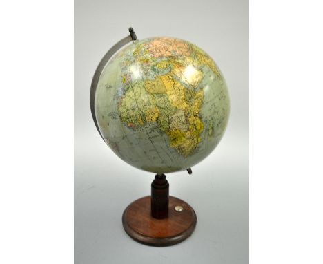 A SECTIONAL TERRESTRIAL GLOBE, on later wooden stand with inset compass, approximately 56cm high (tears/losses)