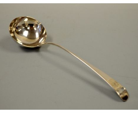 A SILVER LADLE, crested and monogrammed to handle, marks rubbed, approximately 33.5cm, approximate weight 5.5ozt