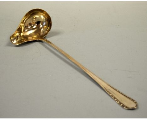 A SILVER LADLE, with pourer, fruit decoration to handle, stamped 800 verso, approximately 35.5cm, approximate weight 5.5ozt