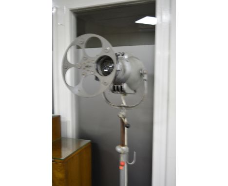 A PAINTED ALUMINIUM STRAND ELECTRIC THEATRICAL SPOTLIGHT, on adjustable tripod floor standing base, approximately 268cm high