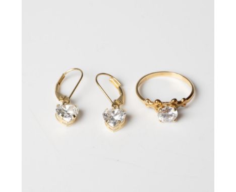 The earrings are have heart shaped CZ stones and are marked 14k. They measure approximately 1"L. The ring has a round CZ ston