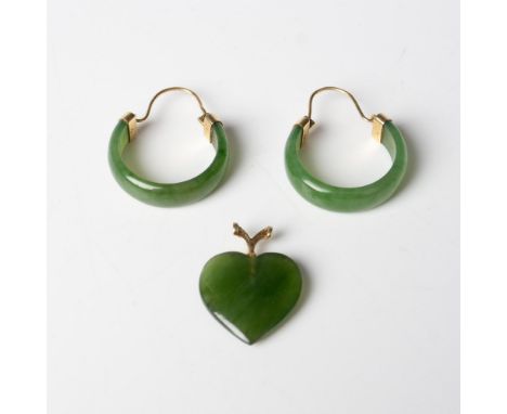 14 karat yellow gold and green jade earrings and pendant marked 14K. The pendant is heart shaped and has a small diamond acce