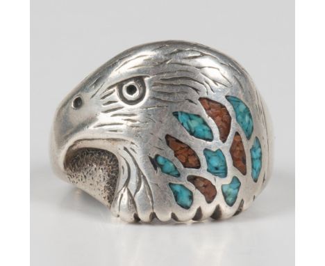 Beautiful ring marked sterling inside the band. The bird is inlaid with turquoise and coral chips. 10g total weight. Size 8.7