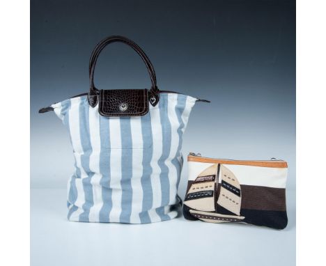Blue and white striped canvas foldout bag with brown leather double handles and button snap closure. Small shoulder canvas ba