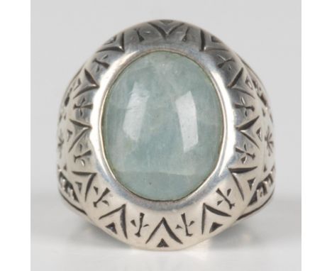 Native American style ring with a carved sterling silver band and Amazonite stone. Carolyn Pollack and sterling silver hallma