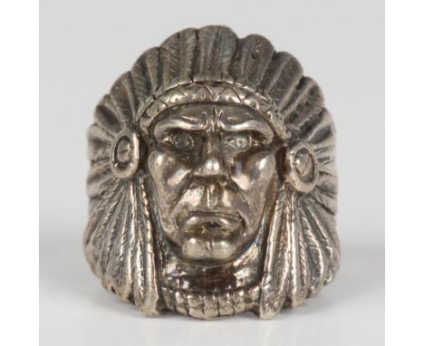 This handsome ring features the face of a Native American wearing a traditional headdress. Marked sterling. Size 9. 14g total
