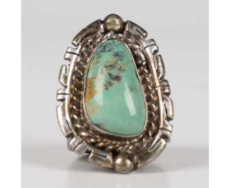 Beautiful Southwestern Native American ring marked DC Sterling inside the band. 18g total weight. Size 8.25. Dimensions: See 