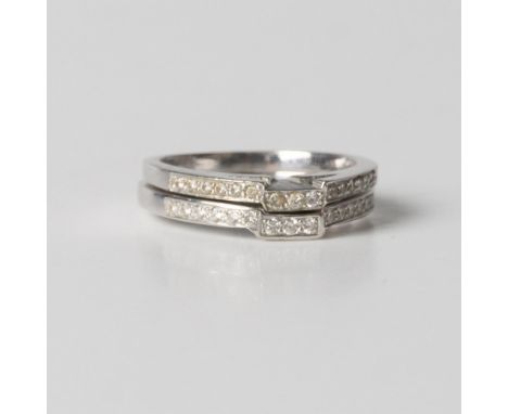 This beautiful ring features 14k white gold set with 0.20ct diamonds. Marked 14k inside the band. Size 8. Dimensions: See Des