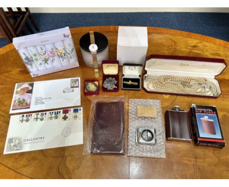 Mixed Lot of Collectibles, to include a gold plated ladies Bering wristwatch, a new leather tobacco pouch, two First Day Cove