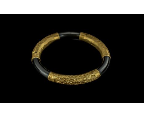 Chinese Early 20th Century 21ct Gold Banded Bangle with embossed naturalistic floral design, signed with Chinese character ma