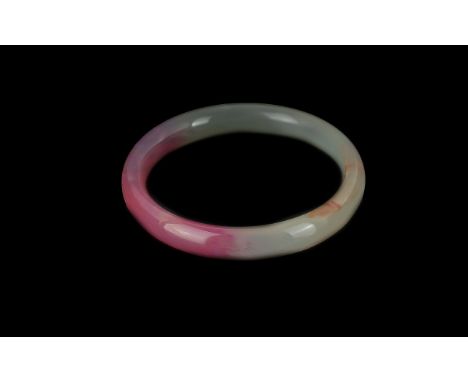 Lavender Jade Bangle, in shades of pale green and pink.