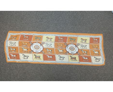 Hermes Vintage Scarf, decorated with horses with orange and cream background.  Measures 60'' x 20''.