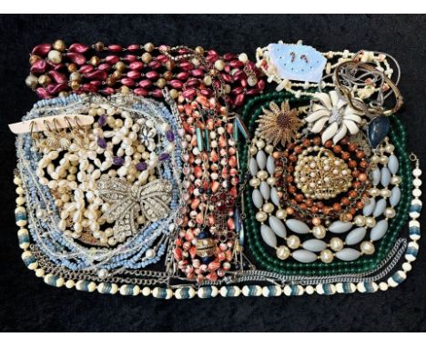 A Collection of Vintage Costume Jewellery to include necklaces, pearls, brooches, gold tone necklaces and bracelets etc.