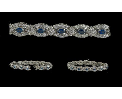 Ladies - Attractive 14ct White Gold Diamond and Sapphire Set Bracelet. Marked 14ct. The Blue Sapphires of Pleasing Colour. Es