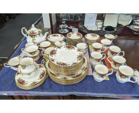 Royal Albert 'Old Country Roses' Tea/Dinner Service, comprising tea pot, milk jug, sugar bowl, ten cups and saucers, six mugs