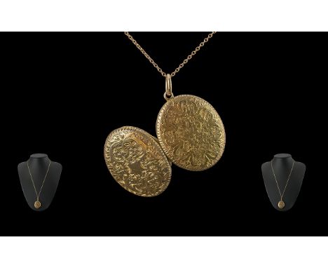 Edwardian Period 1901 - 1910 15ct Gold Double Hinged Locket Attached to 9ct Gold Chain. The Locket of Oval Form with Embossed