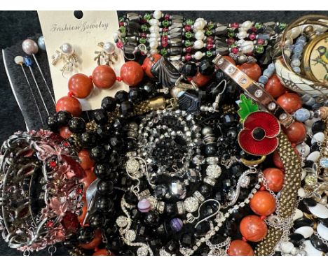 A Collection of Vintage Costume Jewellery to include necklaces, pearls, brooches, gold tone necklaces and bracelets etc.